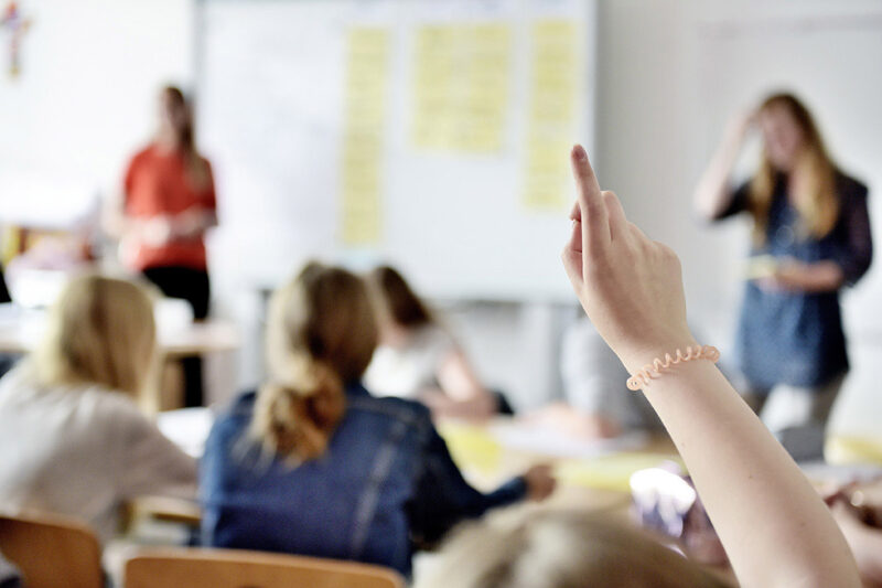 Student raising hand