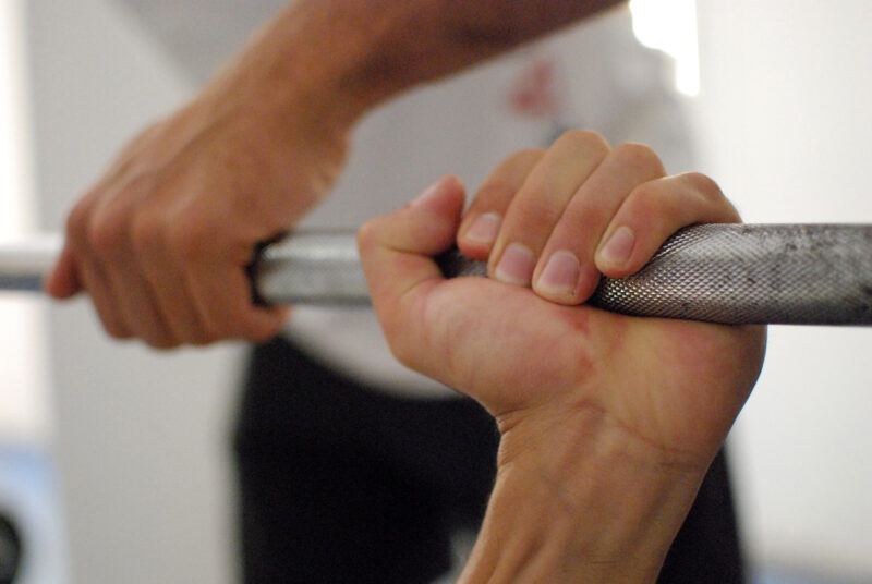 Hands on a barbell
